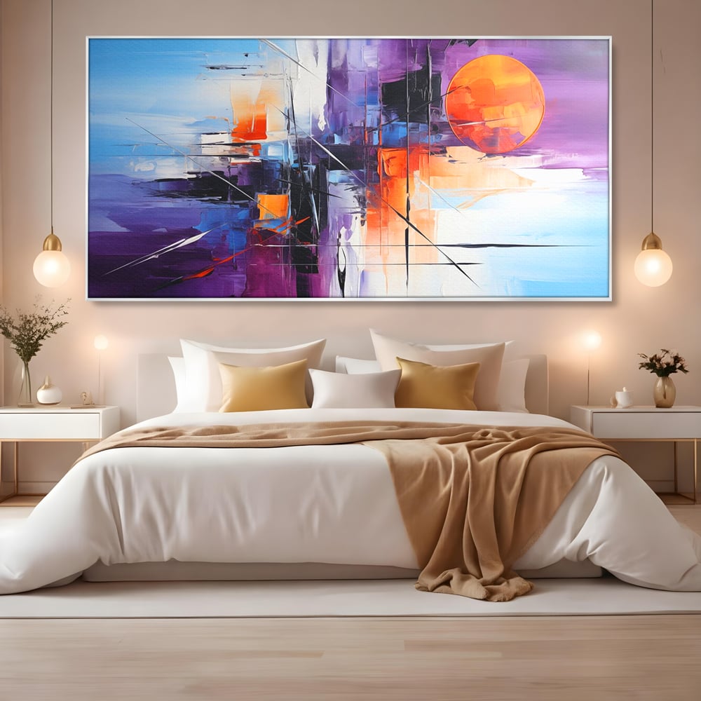 Tablou canvas cu pictura abstracta cu soare portocaliu, in rama de aluminiu argintiu, pe perete intr-un dormitor